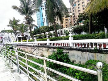 View of railroad tracks by building