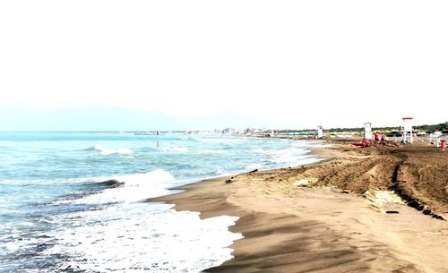 Scenic view of beach against clear sky