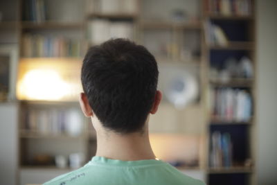 Rear view of man at home