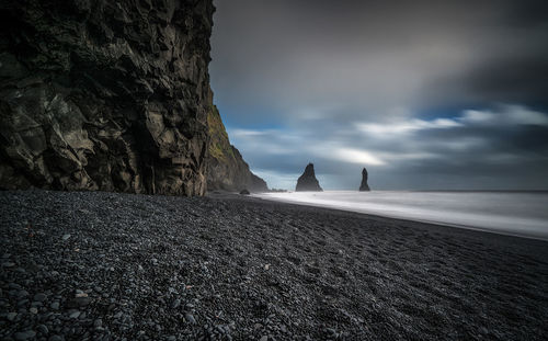 Long exposure view of black sand beach near vik, iceland