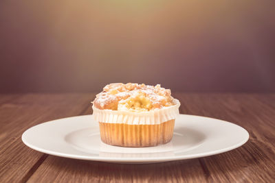 Close-up of cake served on table