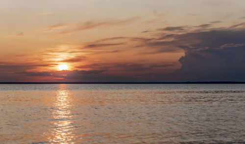 Scenic view of sea against sky during sunset