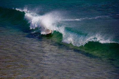 Waves splashing on rocks