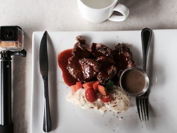 Close-up of breakfast served on table