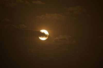 Low angle view of moon against sky at night