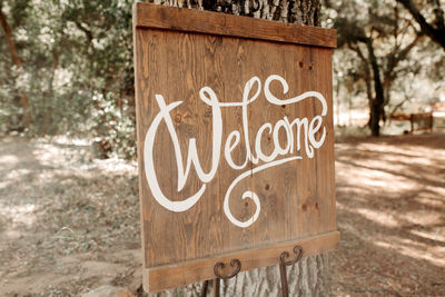 Welcome sign on wooden board at the park