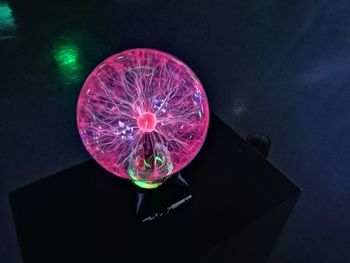 High angle view of illuminated lighting equipment on table