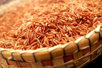 High angle view of rice in wicker basket