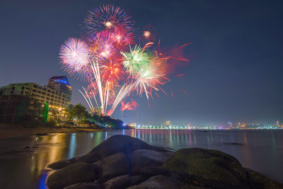 Firework display at night