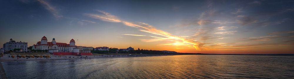 Panoramic view of sea against sky during sunset