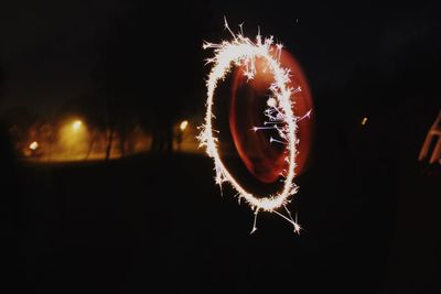 Close-up of illuminated firework display at night