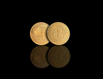 Close-up of bitcoin on black background