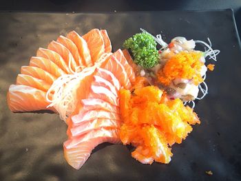 High angle view of orange fish in plate