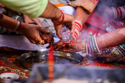 Midsection of man preparing food