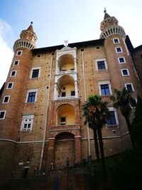 Low angle view of old building against sky