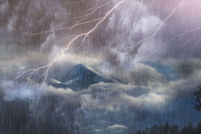 Full frame shot of lightning over mountain