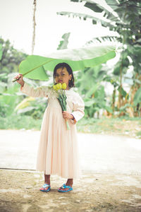 Full length of woman standing in traditional clothing