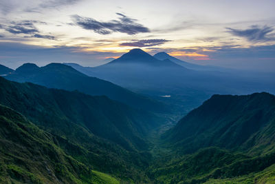 Scenic view of mountains against sky during sunset