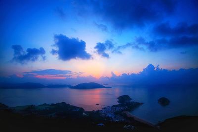 Scenic view of sea against sky at sunset