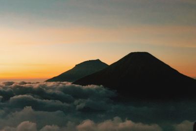 Scenic view of dramatic sky during sunset