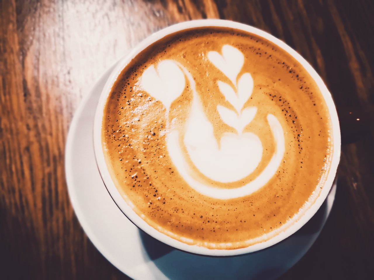 CLOSE-UP OF COFFEE ON TABLE