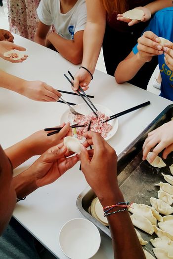 Making dumplings together 