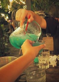 Close-up of hand holding drink