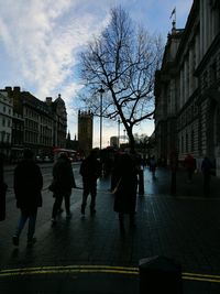 People walking on street in city