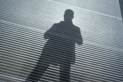 Full length of silhouette man against blurred background