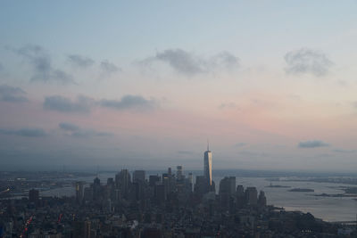 High angle view of buildings at manhattan during sunset