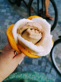 Midsection of person holding ice cream cone