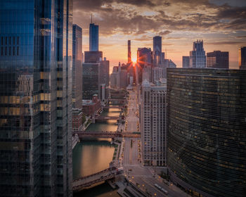 High angle view of city at sunset