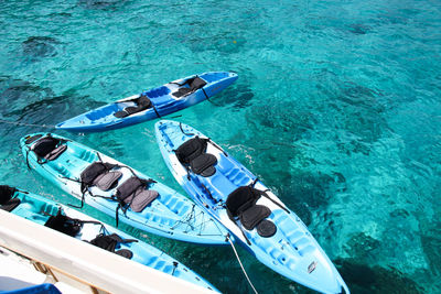 High angle view of kayaks in sea