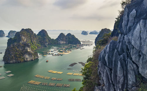 Panoramic view of bay against sky