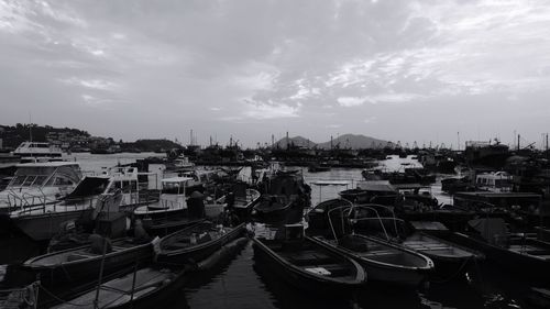 Boats moored at harbor