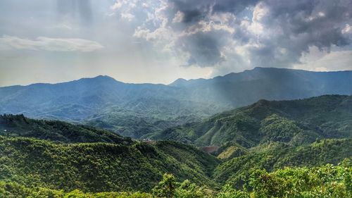 Panoramic view of landscape and mountains against sky