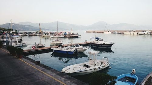 High angle view of boats moored at harbor