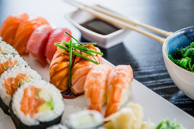 Close-up of sushi served on table