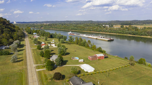 High angle view of river amidst landscape against sky