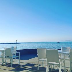 Scenic view of sea against clear blue sky