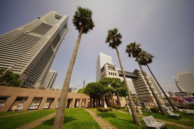 Low angle view of office building against sky