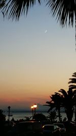 Scenic view of beach against sky during sunset