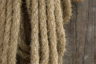 Hemp rope on wood background