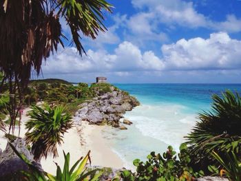 Scenic view of sea against cloudy sky