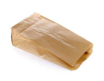 High angle view of bread against white background