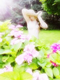 Close-up of flower statue on grass