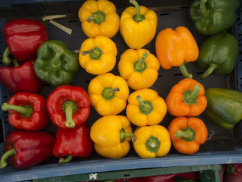 High angle view of bell peppers for sale at market stall