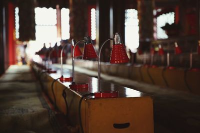 Desk lamps arranged on table in room