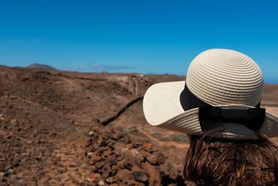 Close-up of hat against clear sky