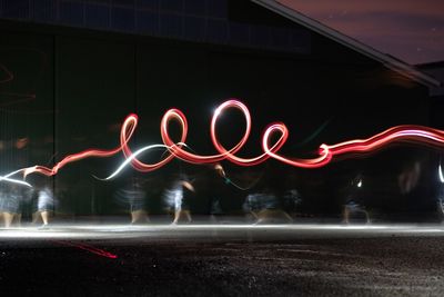 Light trails on street at night